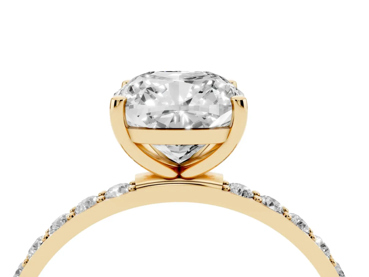 Cushion Cut Diamond Solitaire Ring with Round Pavé Shoulders and Prong Setting Yellow gold