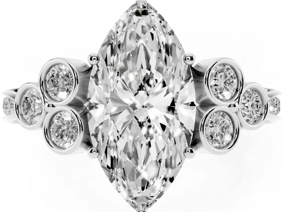 Marquise Cut Cut Diamond Engagement Ring with Bezel Set Round Side Stones and Prong Setting Silver