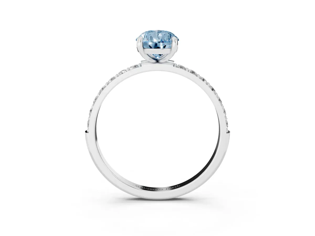 Fancy Blue Pear Cut Diamond Solitaire Ring with Round Pavé Band and Prong Setting Platinum