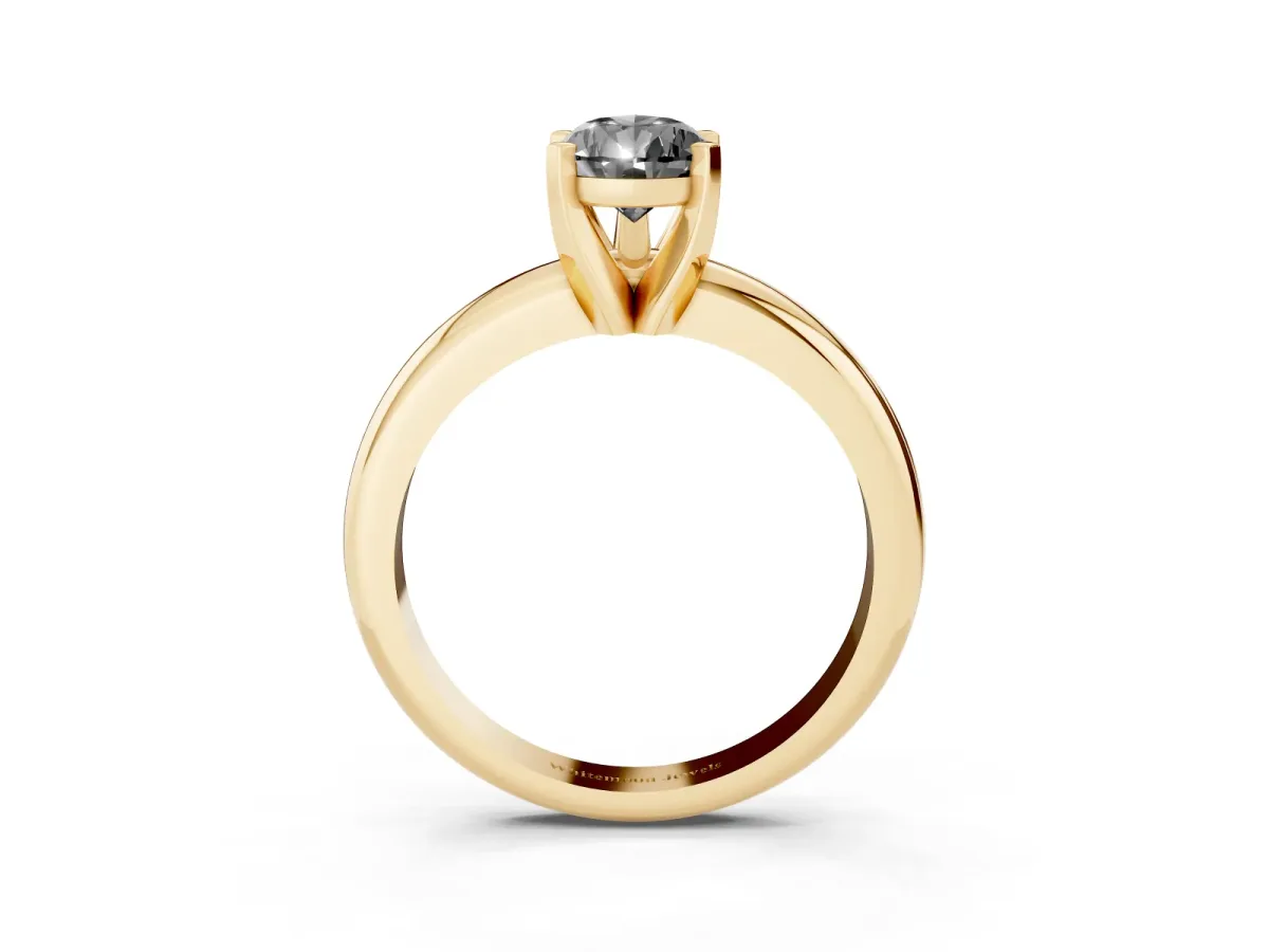 Fancy Black Pear Cut Diamond Solitaire Engagement Ring with Round Band and Four-Prong Setting Yellow gold