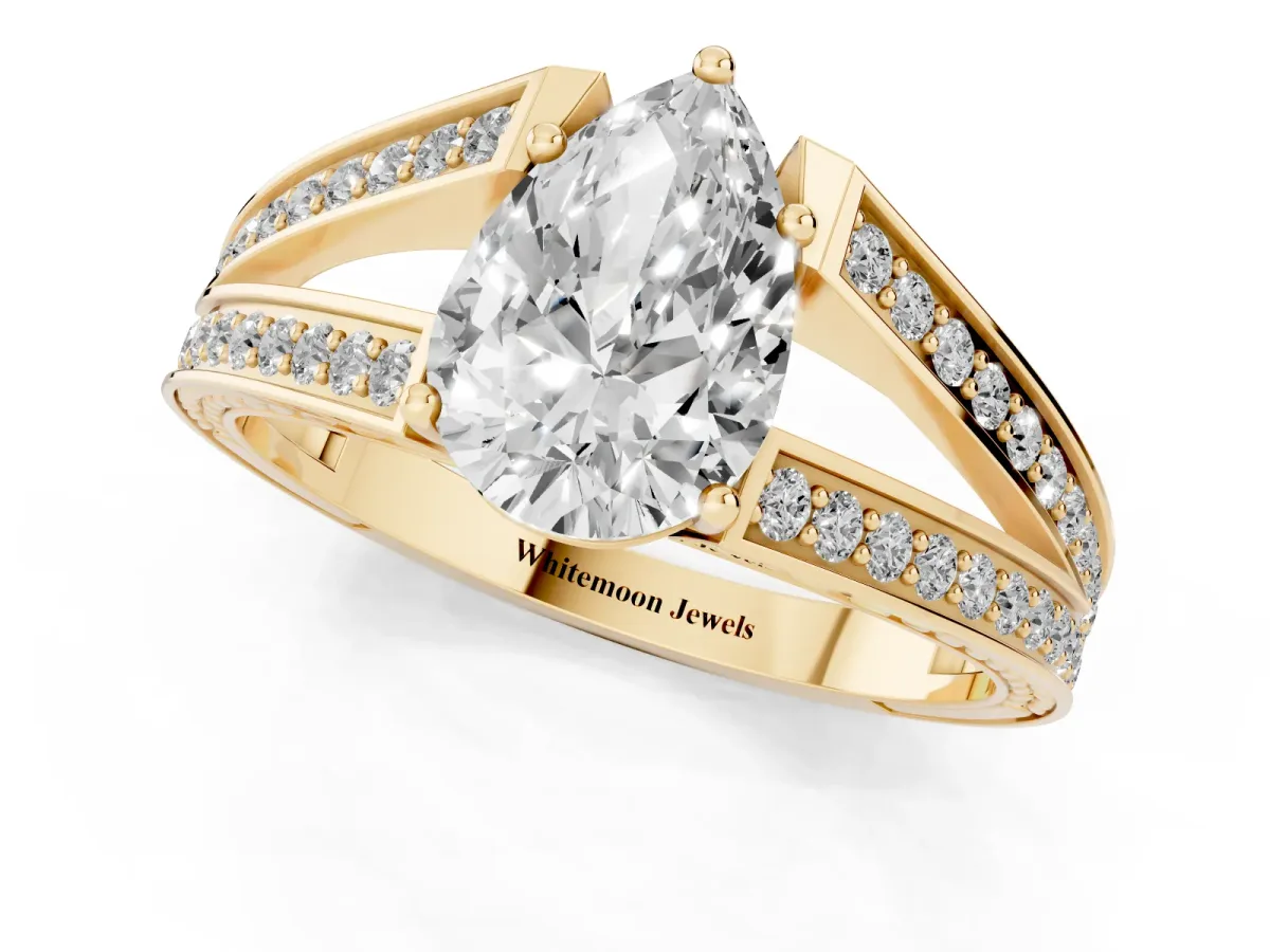 Pear Cut Diamond Split Shank Ring with Pavé Band and Four-Prong Setting Yellow gold