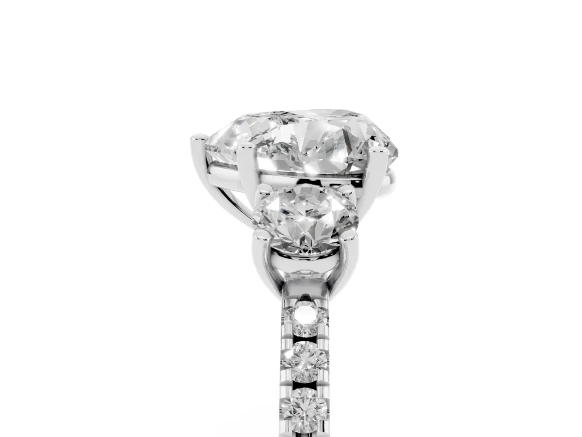 Three-Stone Heart Cut Cut Diamond Pavé Band with Prong Setting Platinum