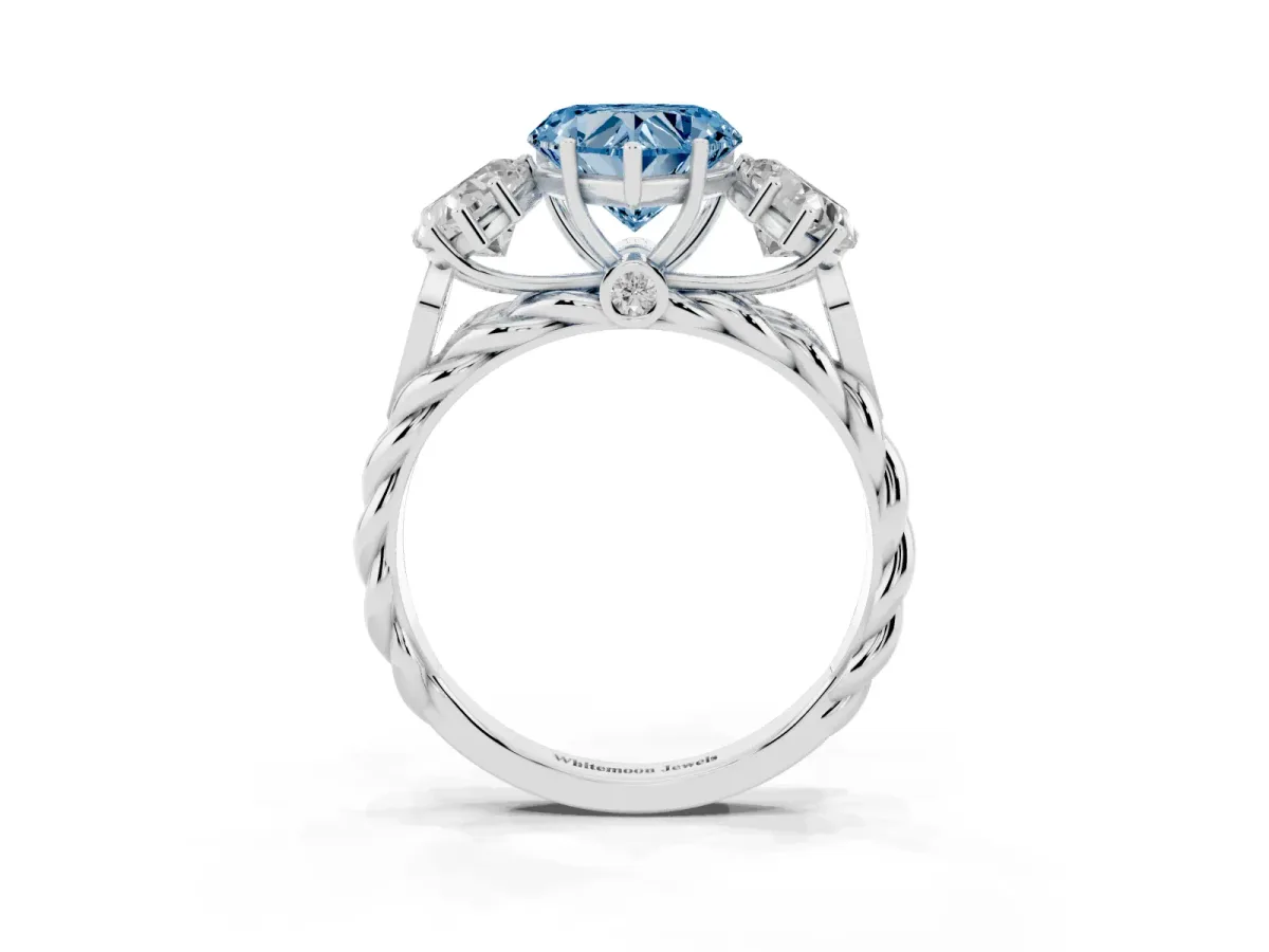 Fancy Blue Three-Stone Heart Cut Diamond Braided Band Ring with Four-Prong Setting Platinum