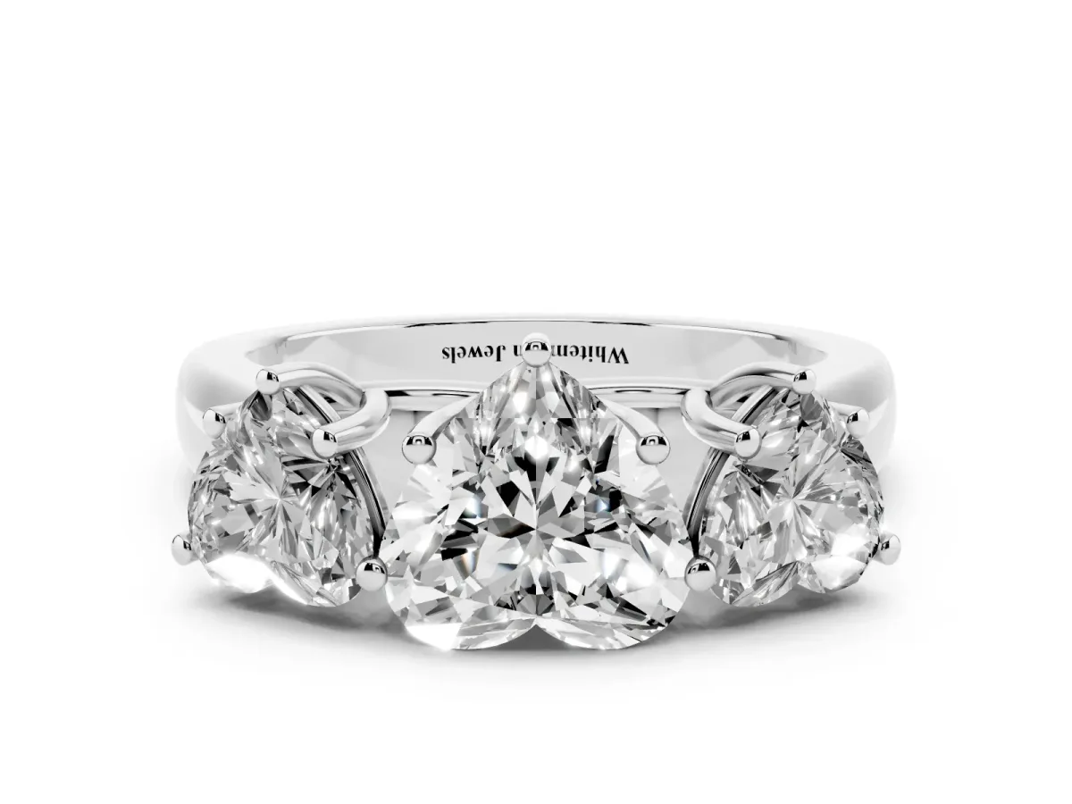 Heart Cut Three-Stone Diamond Ring with Prong Setting on a Classic Band White gold