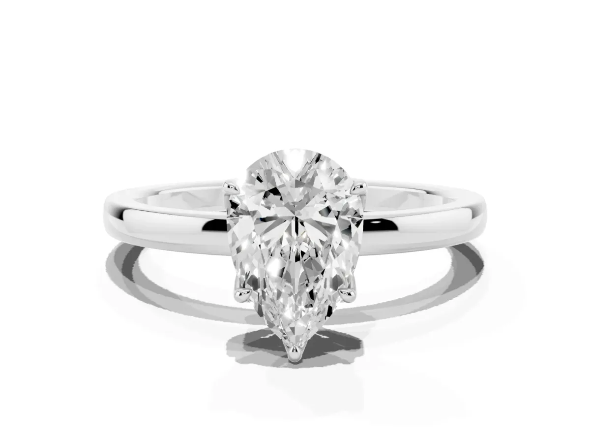 Pear Cut Diamond Solitaire Ring with Thin Band and Prong Setting Platinum