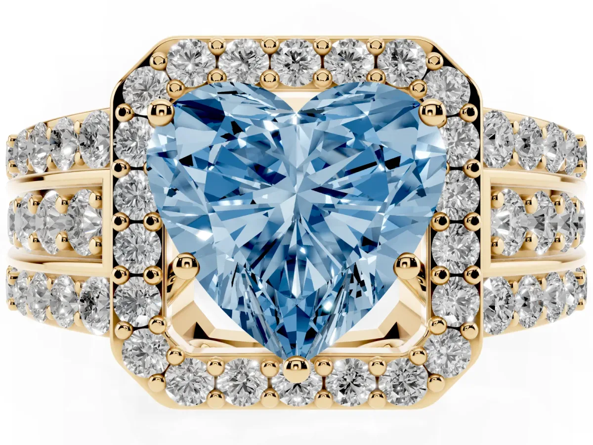 Fancy Blue Heart Cut Halo Diamond Ring with Round Split Shank and Prong Setting Yellow gold