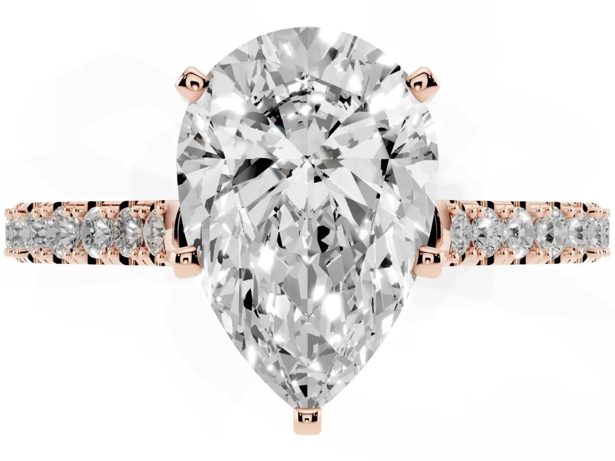 Pear Cut Cut Solitaire Diamond Engagement Ring with Pave Band and Four-Prong Setting Rose gold