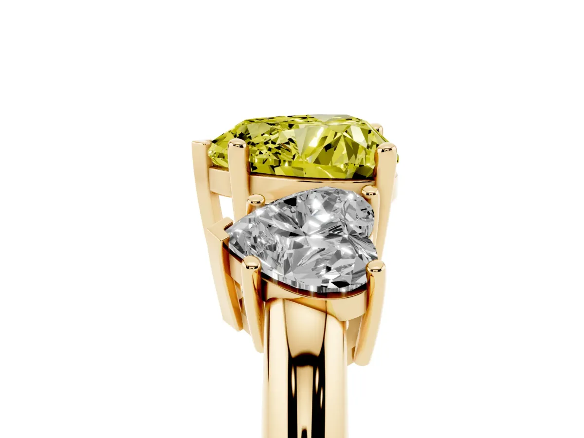 Fancy Yellow Three-Stone Heart Cut Cut Diamond Engagement Ring with Prong Setting on a White Gold Band Yellow gold