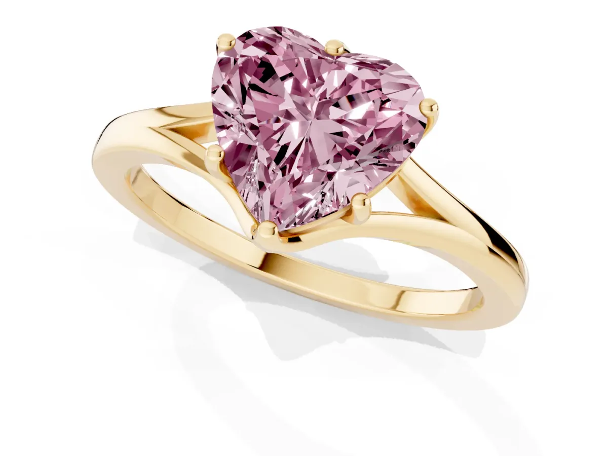 Fancy Pink Heart Cut Solitaire Diamond Ring with Six-Prong Setting and Tapered Band Yellow gold
