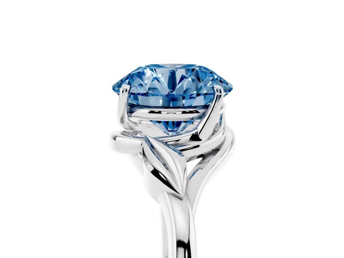 Fancy Blue Round Cut Diamond Solitaire Ring with Twist Band and Four-Prong Setting Silver