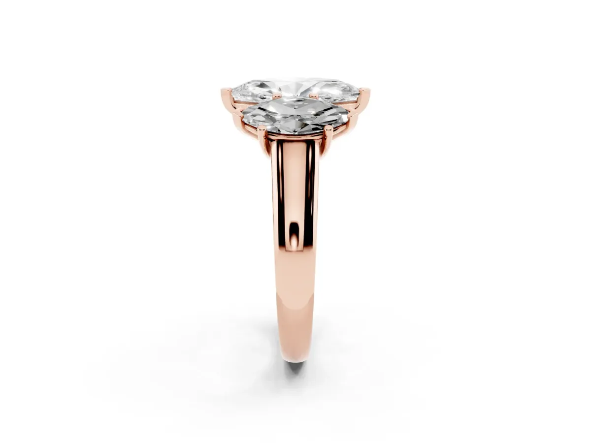 Marquise Cut Three-Stone Diamond Ring with Prong Setting on a Classic Band Rose gold
