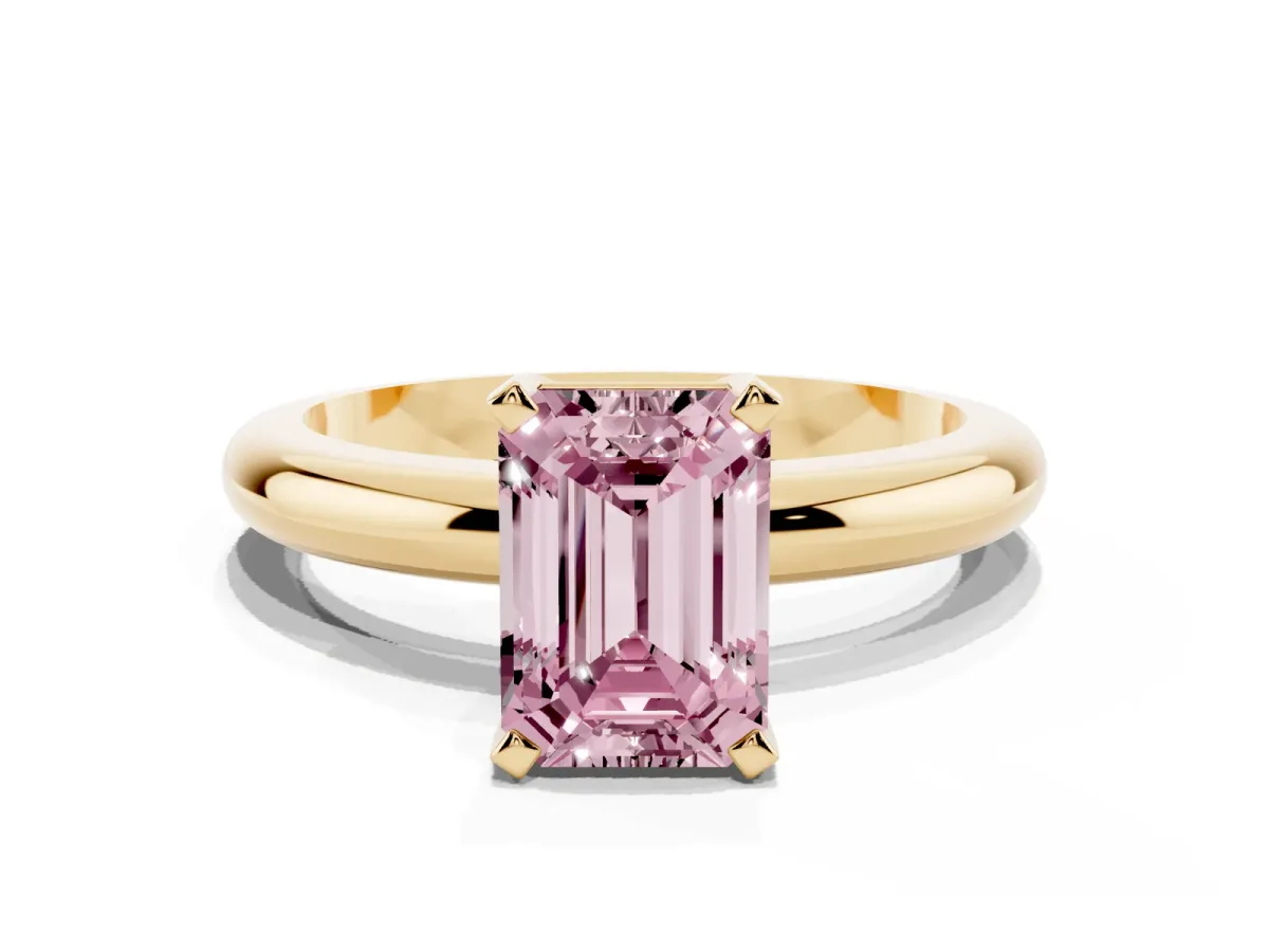 Fancy Pink Emerald Cut Diamond Solitaire Engagement Ring with Round Band and Four-Prong Setting Yellow gold
