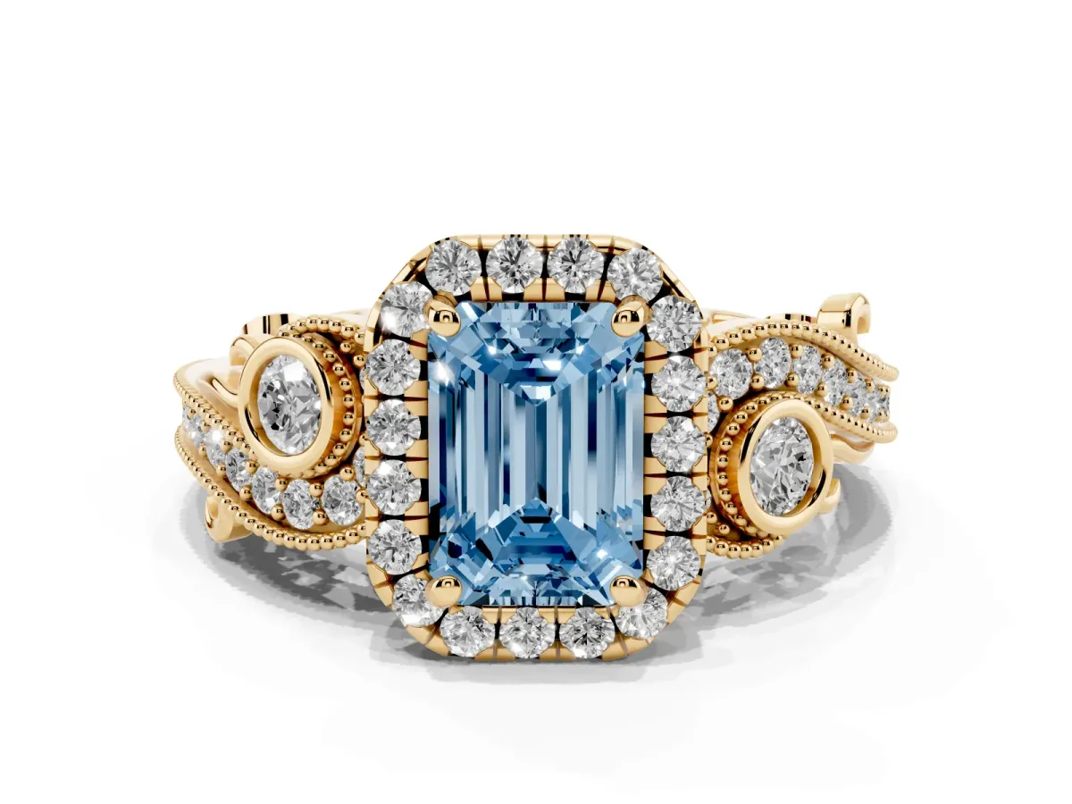 Fancy Blue Emerald Cut Diamond Halo Ring with Milgrain Pavé Band and Four-Prong Setting Yellow gold