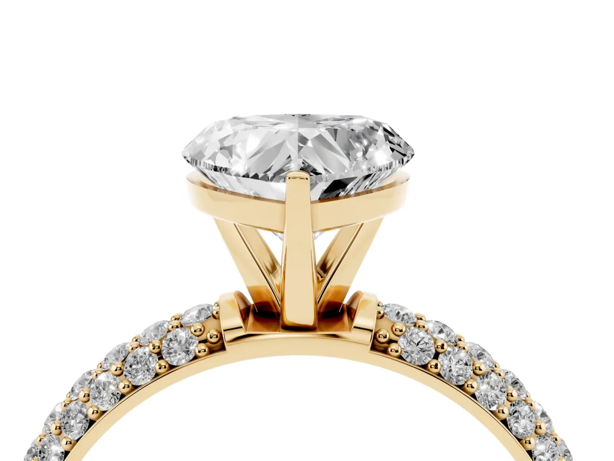 Heart Cut Diamond Solitaire Ring with Prong Setting and Pavé Band Yellow gold