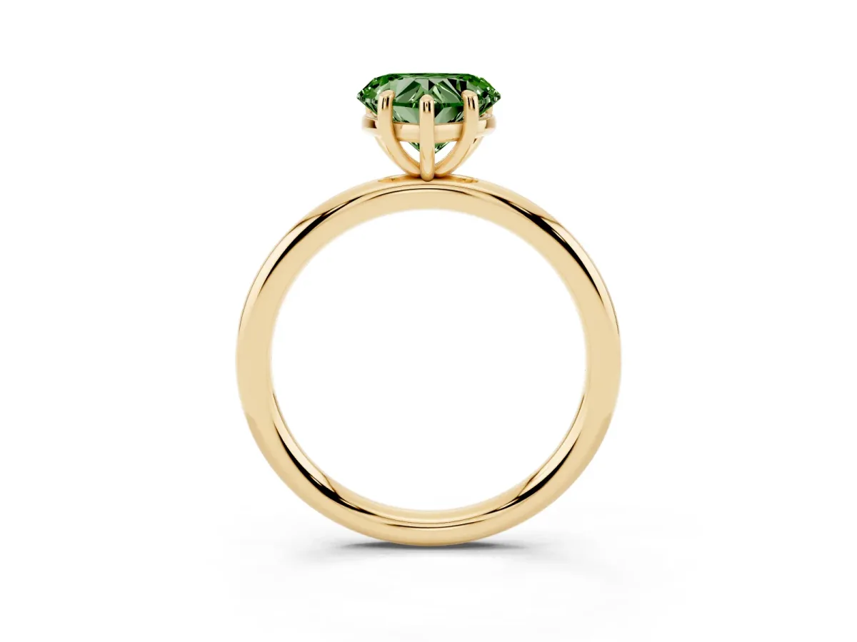 Fancy Green Heart Cut Solitaire Diamond Ring with Four-Prong Setting on a Plain Band Yellow gold