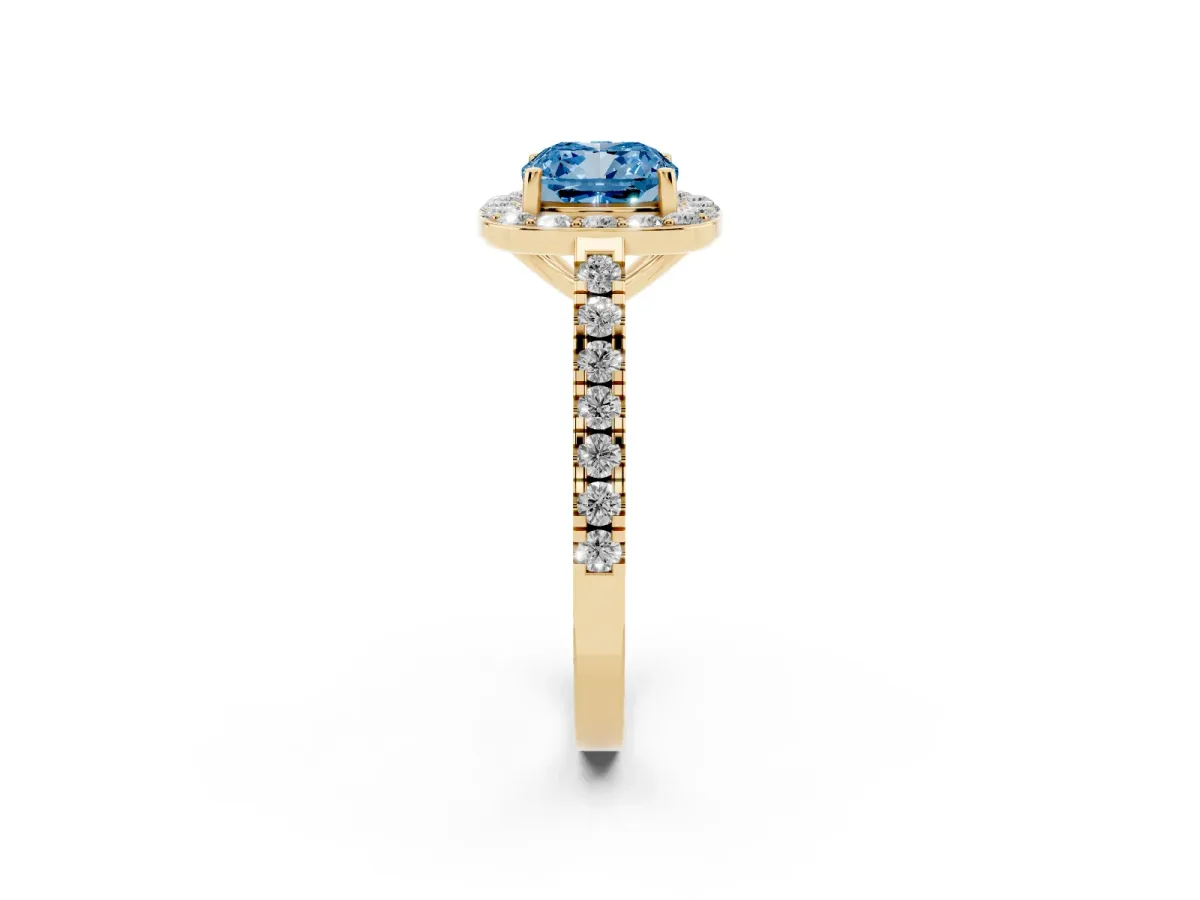 Fancy Blue Cushion Cut Diamond Halo Ring with Round Pavé Split Shank and Prong Setting Yellow gold
