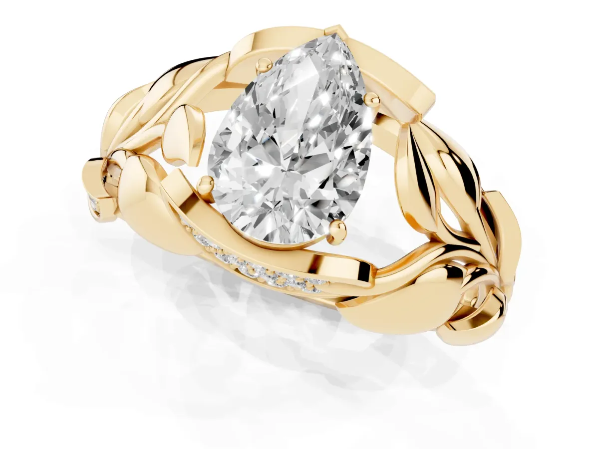 Pear Cut Diamond Leaf-Inspired Engagement Ring with Round Accents and Prong Setting Yellow gold