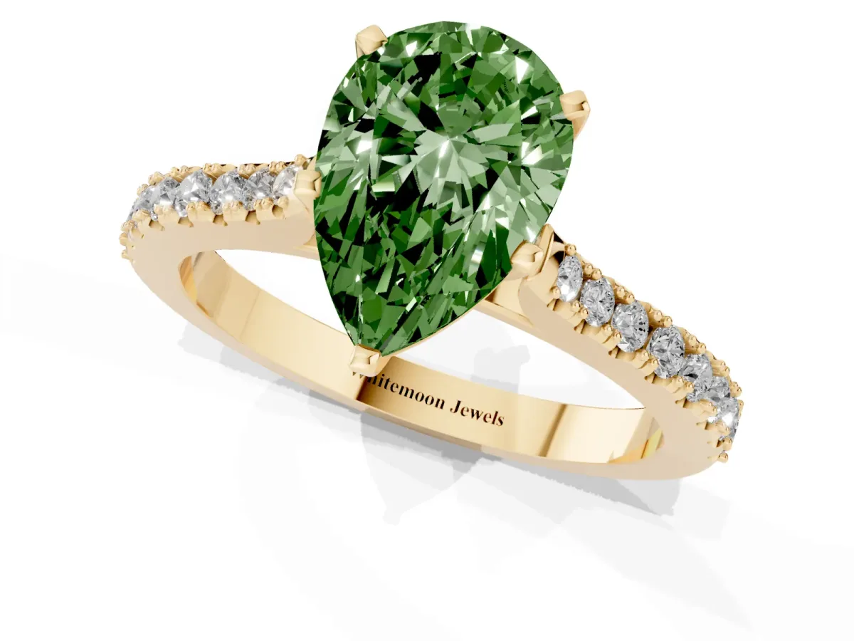 Fancy Green Pear Cut Cut Solitaire Diamond Engagement Ring with Pave Band and Four-Prong Setting Yellow gold