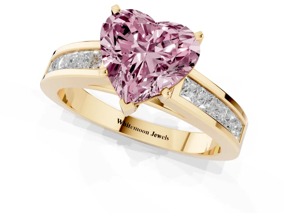 Fancy Pink Heart Cut Solitaire Diamond Ring with Channel-Set Band and Four-Prong Setting Yellow gold