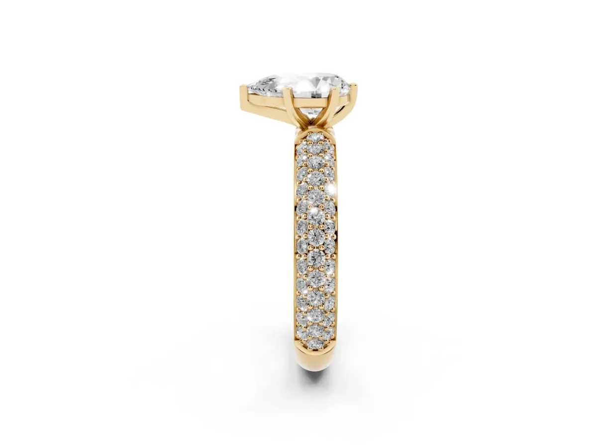 Pear Cut Diamond Solitaire Ring with Prong Setting and Pavé Band Yellow gold