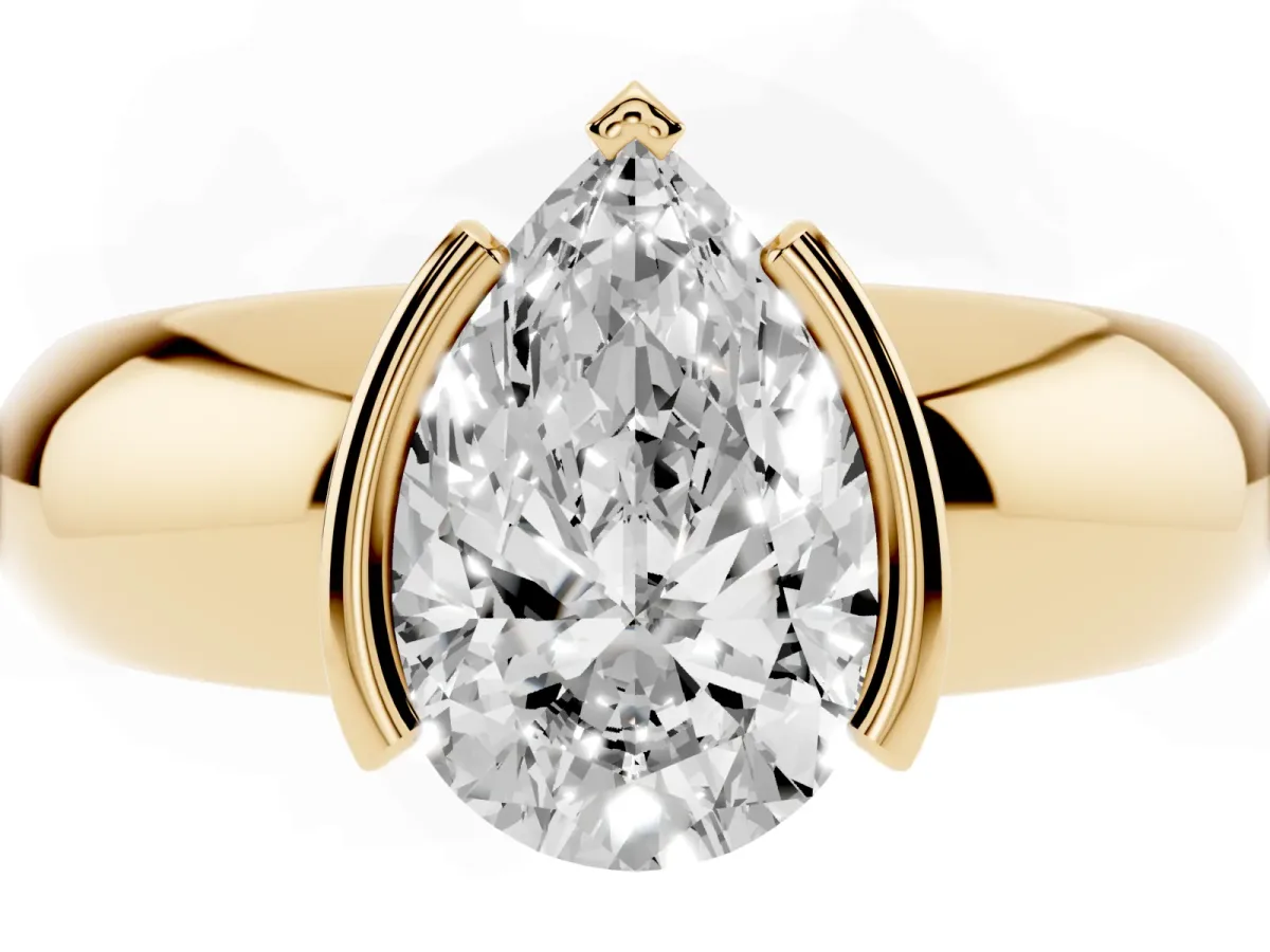 Pear Cut Solitaire Tension Set Diamond Ring with Wide Band Yellow gold