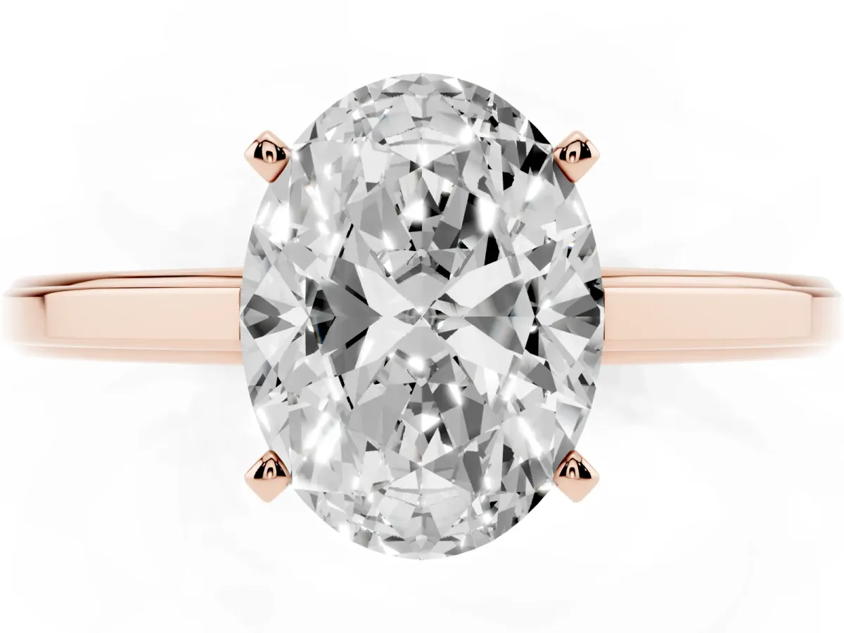 Oval Cut Solitaire Diamond Ring with Four-Prong Setting and Classic Band Rose gold
