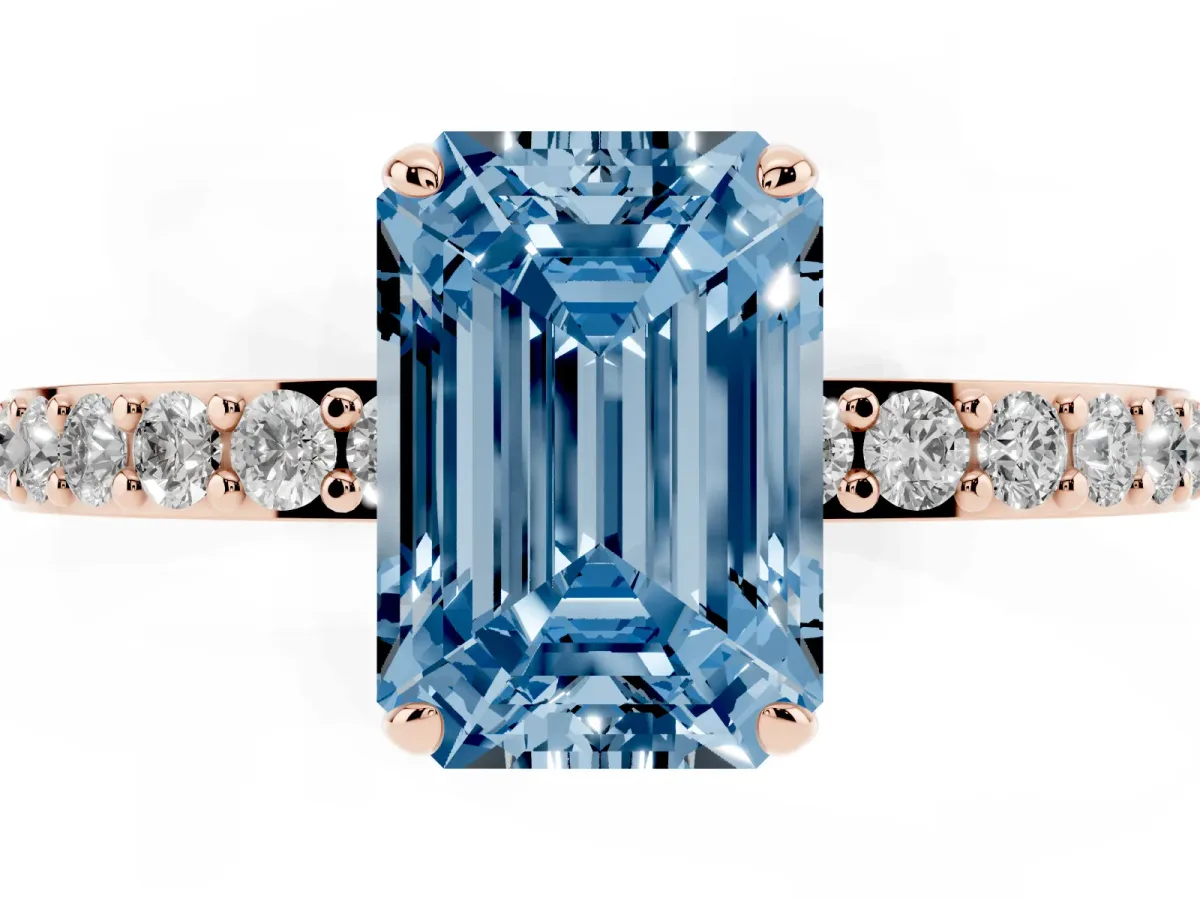 Fancy Blue Emerald Cut Diamond Solitaire Engagement Ring with Pavé Band and Four-Prong Setting Rose gold