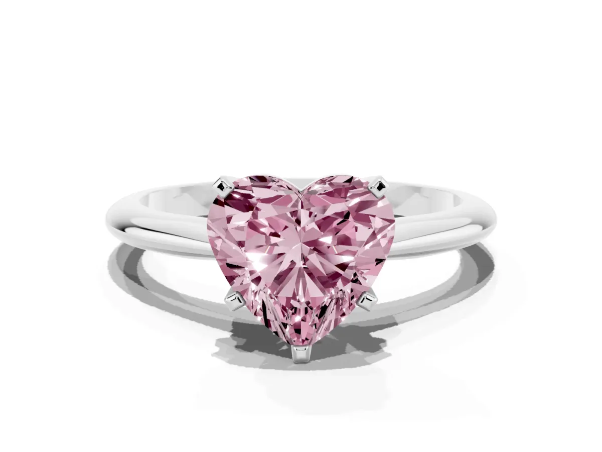 Fancy Pink Heart Cut Cut Solitaire Ring with Four-Prong Setting on a Classic Band Silver