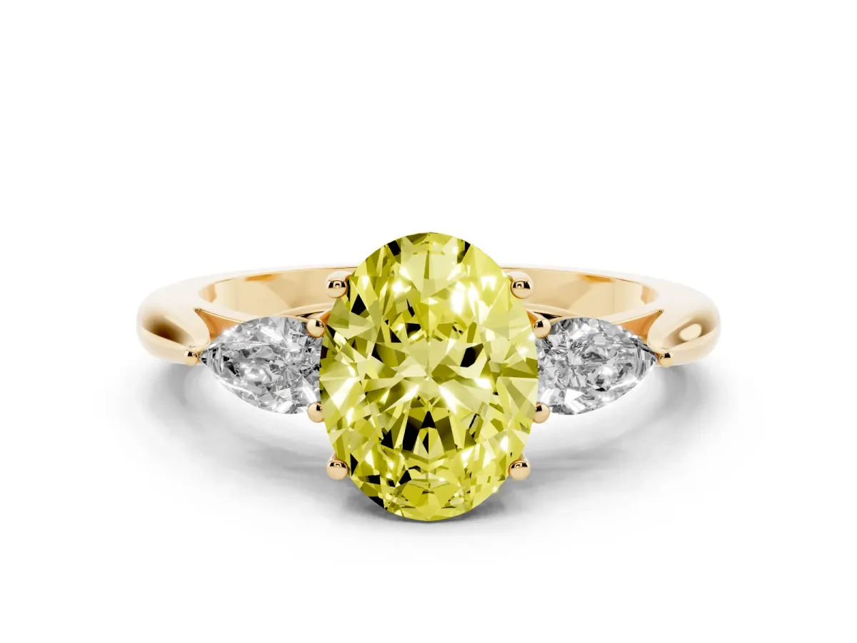 Fancy Yellow Three-Stone Oval Cut Diamond Ring with Pear Side Stones in Four-Prong Setting Yellow gold