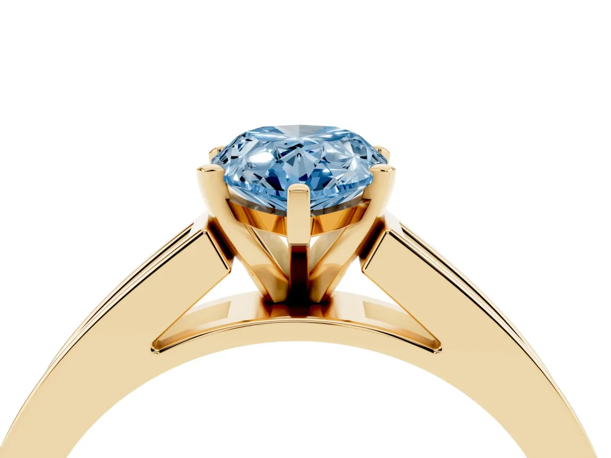 Fancy Blue Pear Cut Solitaire Diamond Ring with Channel-Set Band and Four-Prong Setting Yellow gold