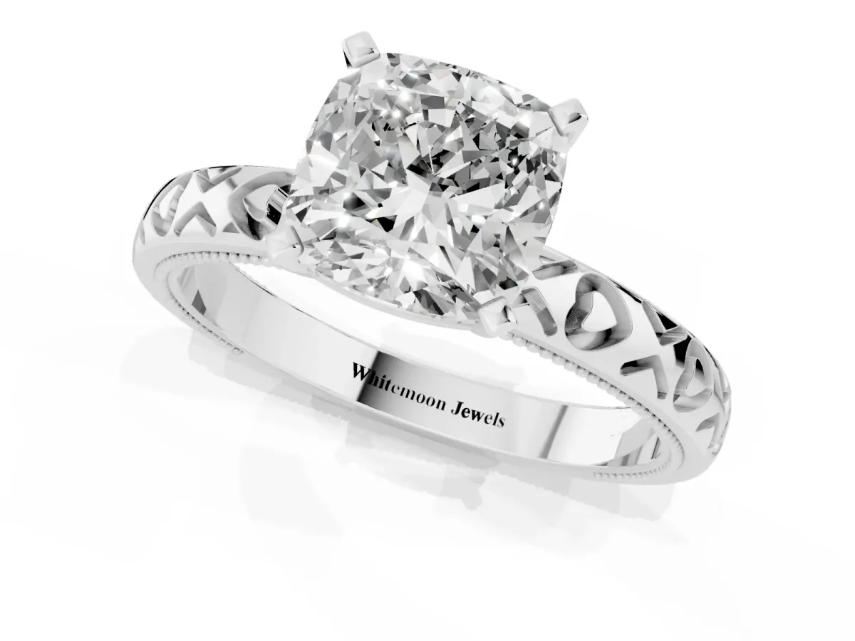 Cushion Cut Solitaire Diamond Engagement Ring with XO Engraved Band and Four-Prong Setting Platinum