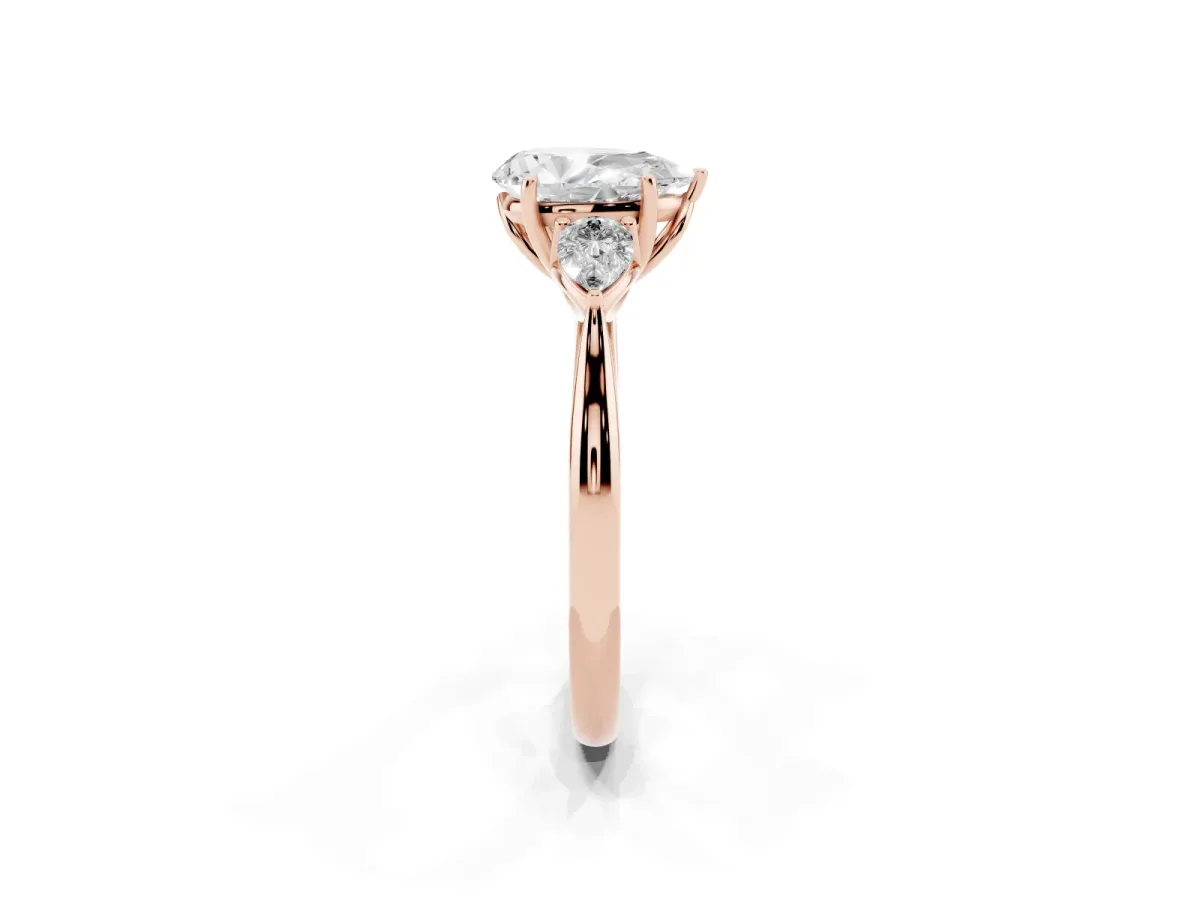 Three-Stone Pear Cut Brilliant Diamond Solitaire Ring with Tapered Band and Four-Prong Setting Rose gold