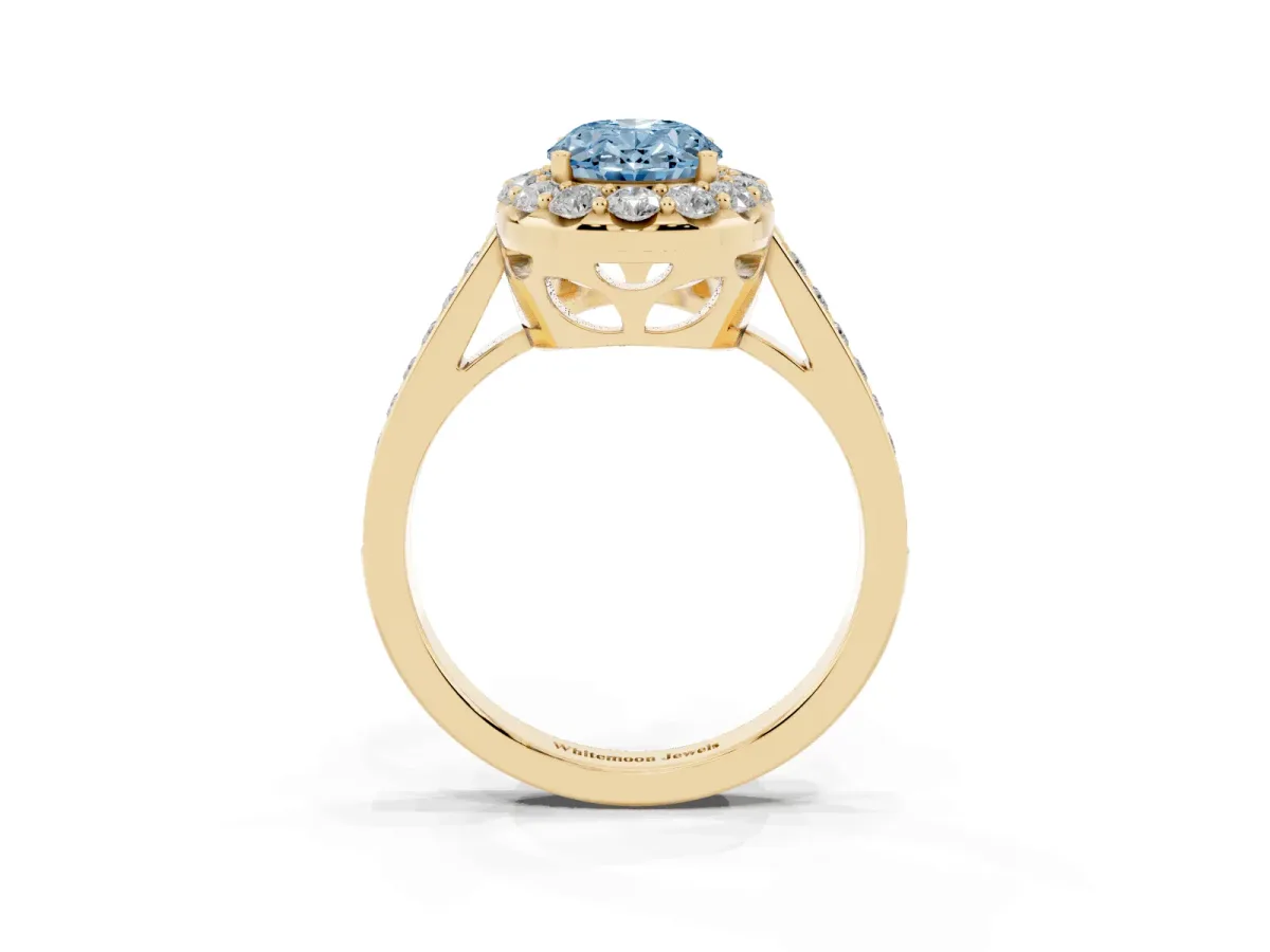 Fancy Blue Oval Cut Diamond Floral Halo Ring with Pavé Band and Prong Setting Yellow gold
