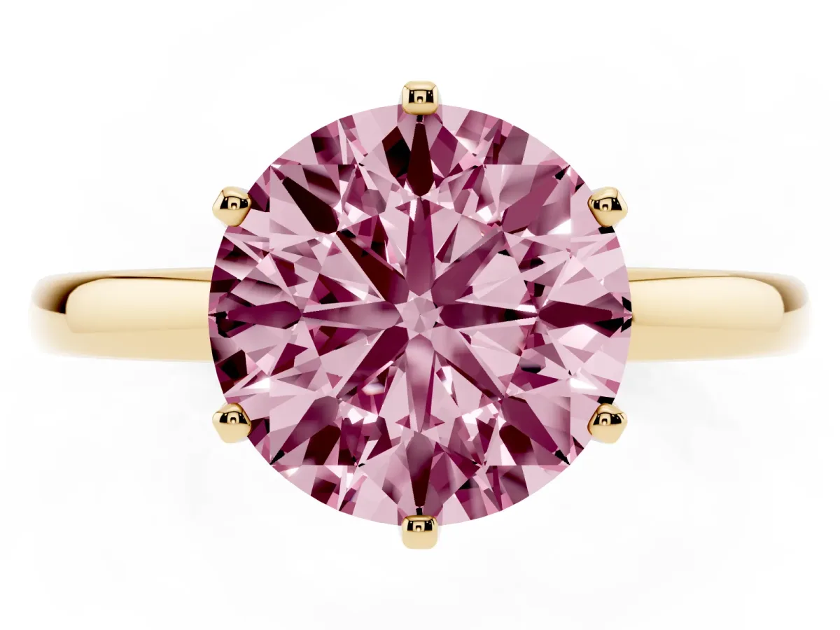 Fancy Pink Round Cut Solitaire Diamond Ring with Six-Prong Setting on a Classic Band Yellow gold