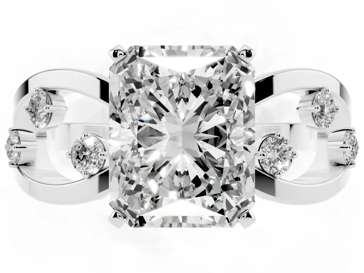 Radiant Cut Cut Solitaire Diamond with Side Stones on Criss-Cross Band and Four-Prong Setting Platinum