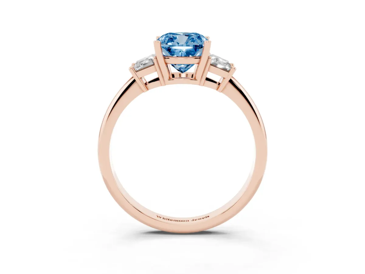 Fancy Blue Cushion Cut Diamond Three-Stone Ring with Trapezoid Side Stones and Prong Setting Rose gold