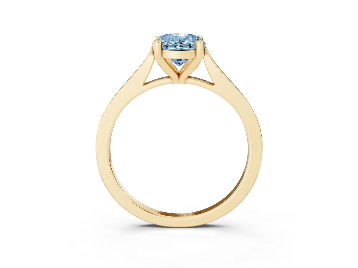 Fancy Blue Oval Cut Solitaire Diamond Ring with Four-Prong Setting and Tapered Band Yellow gold