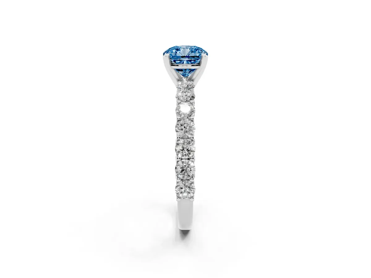 Fancy Blue Cushion Cut Diamond Solitaire Ring with Shared Prong Pavé Band and Four-Prong Setting Silver