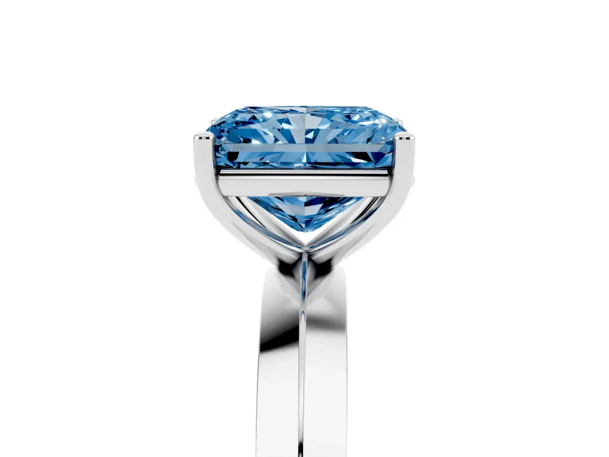 Fancy Blue Radiant Cut Cut Solitaire Engagement Ring with Flat Band and Four-Prong Setting Silver