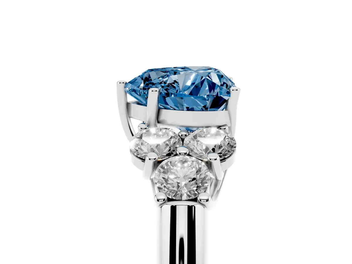 Fancy Blue Heart Cut Cut Diamond Cluster Ring with Round Accent Stones and Prong Setting on a Classic Band White gold