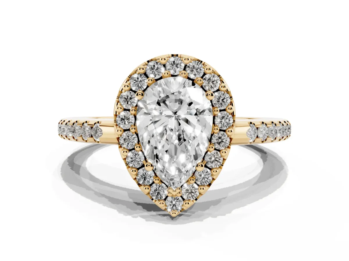 Pear Cut Diamond Pavé Halo Ring with Four-Prong Setting Yellow gold