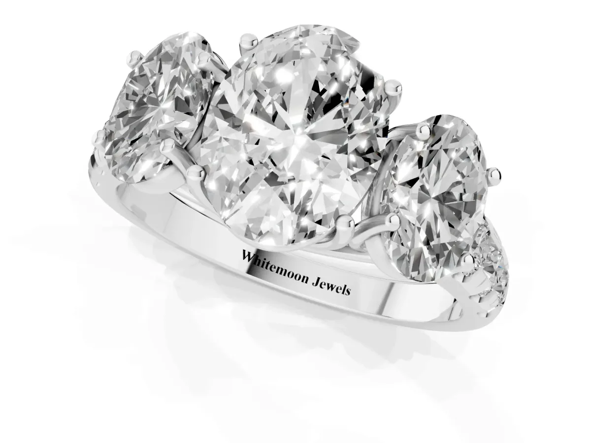 Three-Stone Oval Cut Diamond Pavé Band with Prong Setting Platinum
