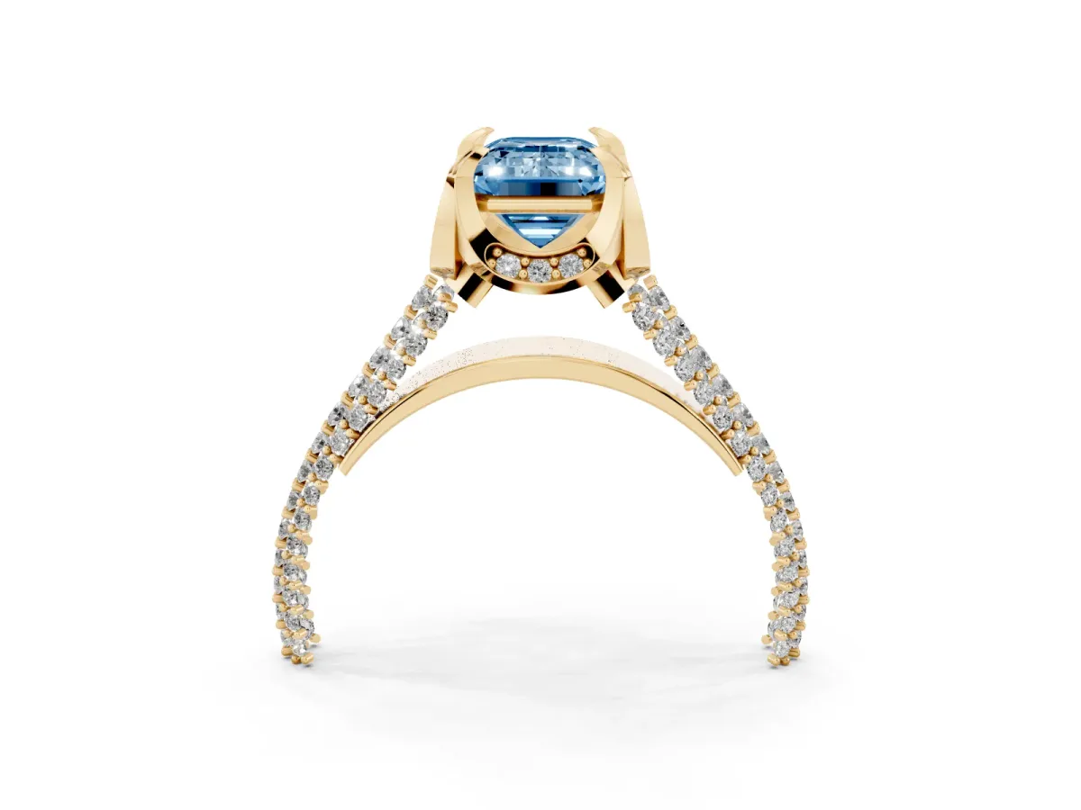 Fancy Blue Emerald Cut Solitaire Pave Split Shank Ring with Four-Prong Setting Yellow gold