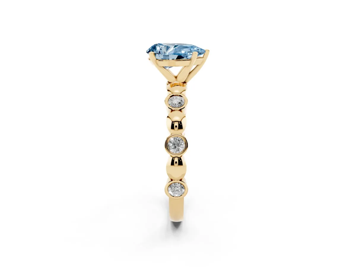 Fancy Blue Pear Cut Solitaire Bezel-Set Diamond Ring with Beaded Band and Four-Prong Setting Yellow gold