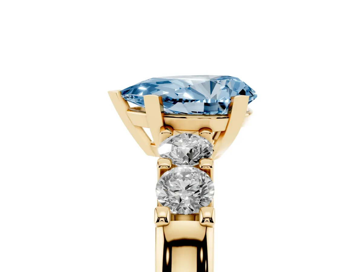 Fancy Blue Pear Cut Brilliant Cut Diamond Five-Stone Prong Set Engagement Ring with Channel Band Yellow gold