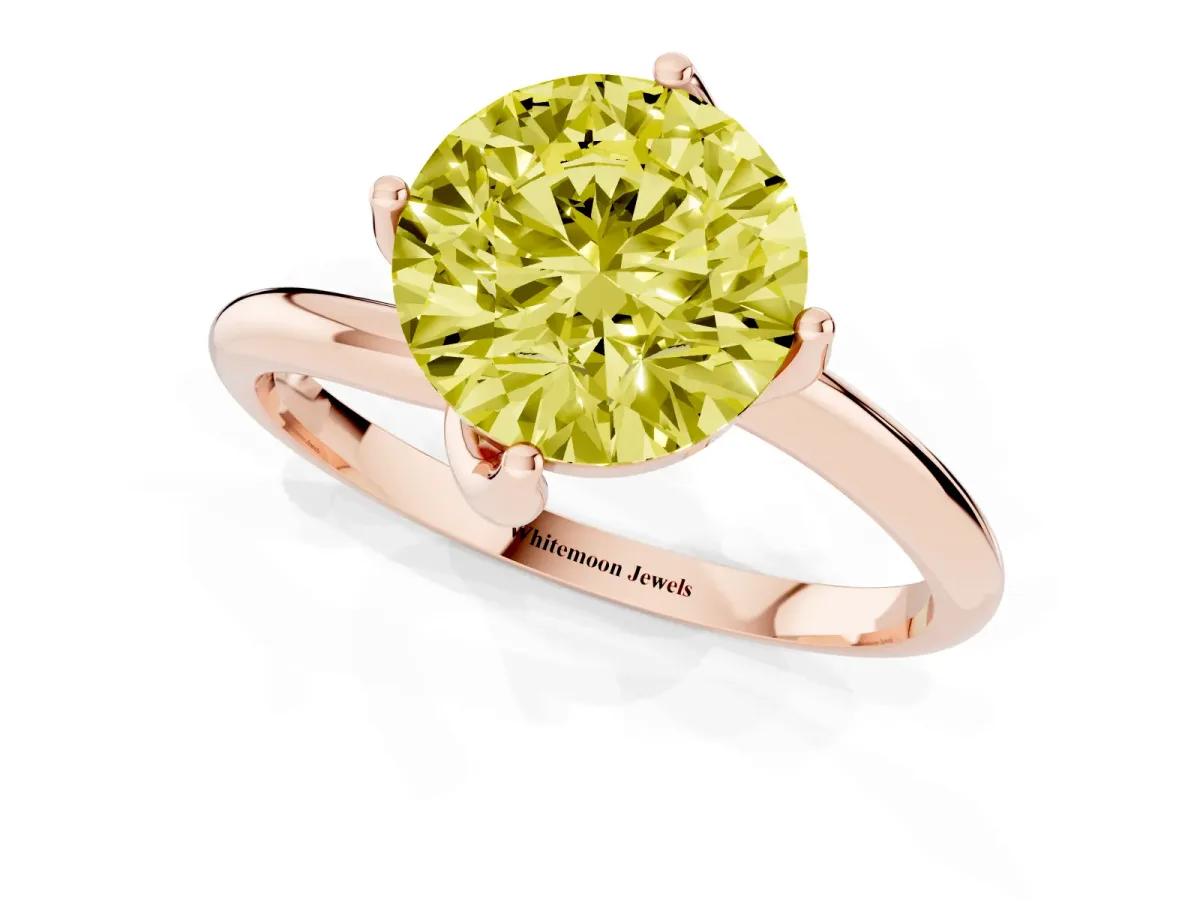 Fancy Yellow Round Cut Diamond Solitaire Engagement Ring with Four-Prong Setting and Classic Band Rose gold
