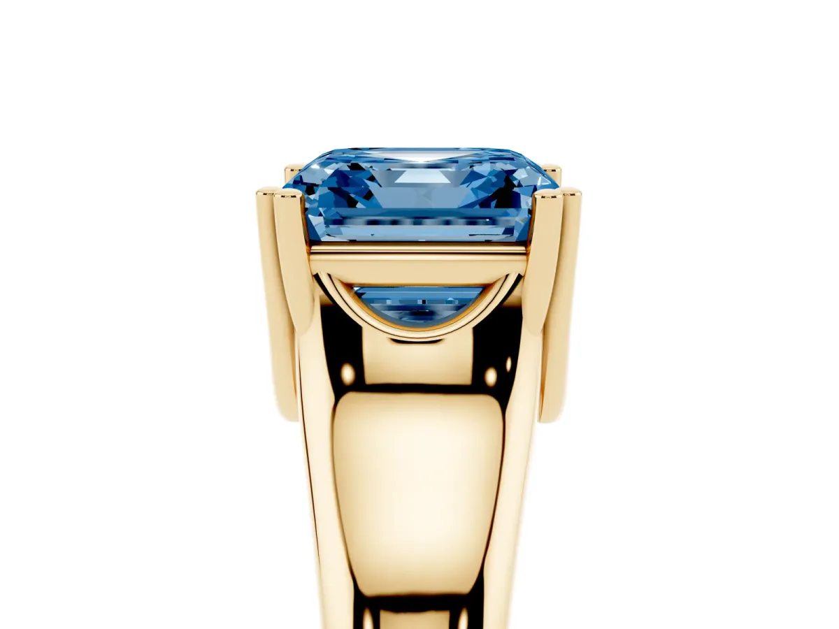 Fancy Blue Asscher Cut Diamond Solitaire Ring with Wide Band and Prong Setting Yellow gold