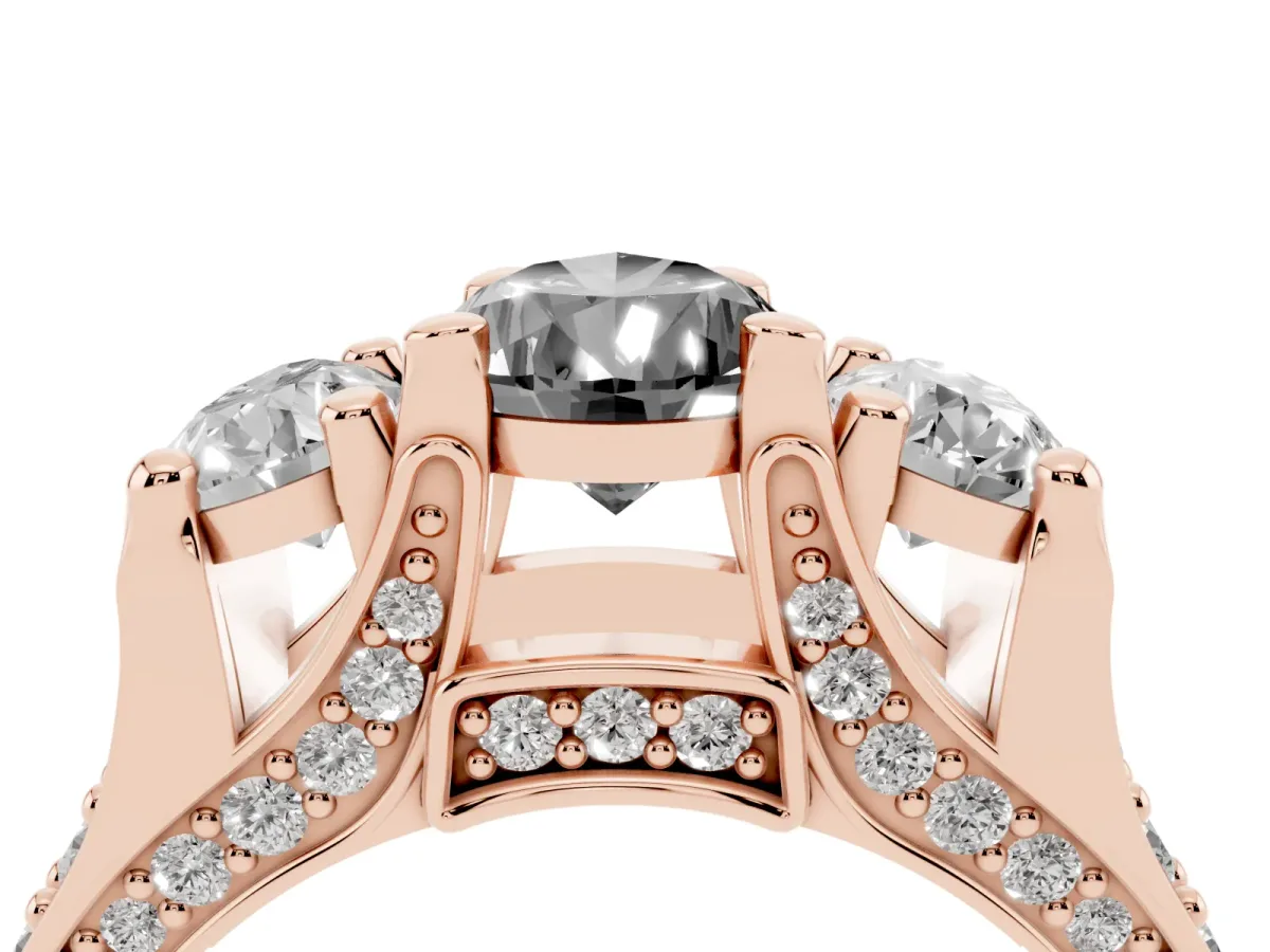Fancy Black Pear Cut Diamond Three-Stone Ring with Channel Set Band and Four-Prong Setting Rose gold