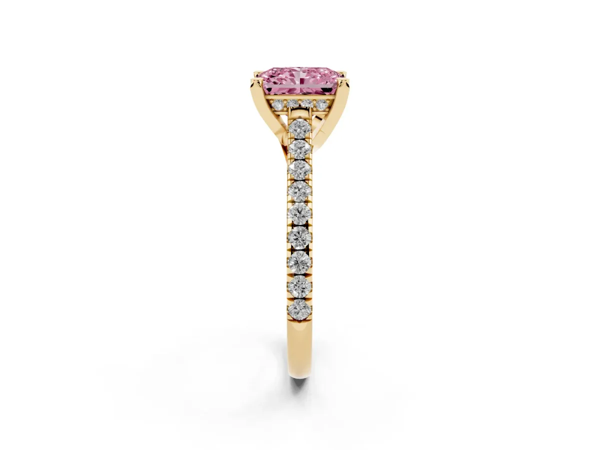 Fancy Pink Radiant Cut Brilliant Diamond Solitaire with Pavé Band and Four-Prong Setting Yellow gold