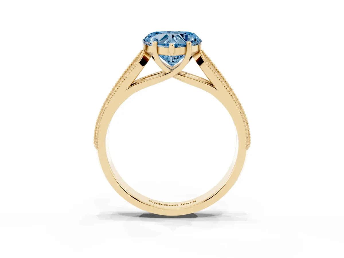 Fancy Blue Heart Cut Cut Pave Split Shank Engagement Ring with Four-Prong Setting Yellow gold